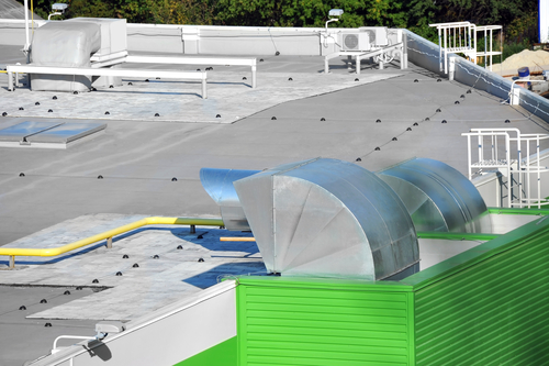 Industrial flat roof with rooftop ventilation equipment