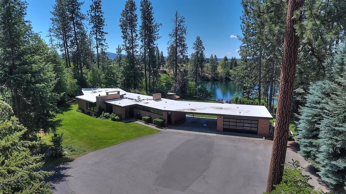 Mid-century, modern, waterfront, luxury estate with a residential flat roof, Spokane, WA